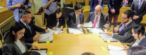 Together in Parliament: Signing on the dotted line